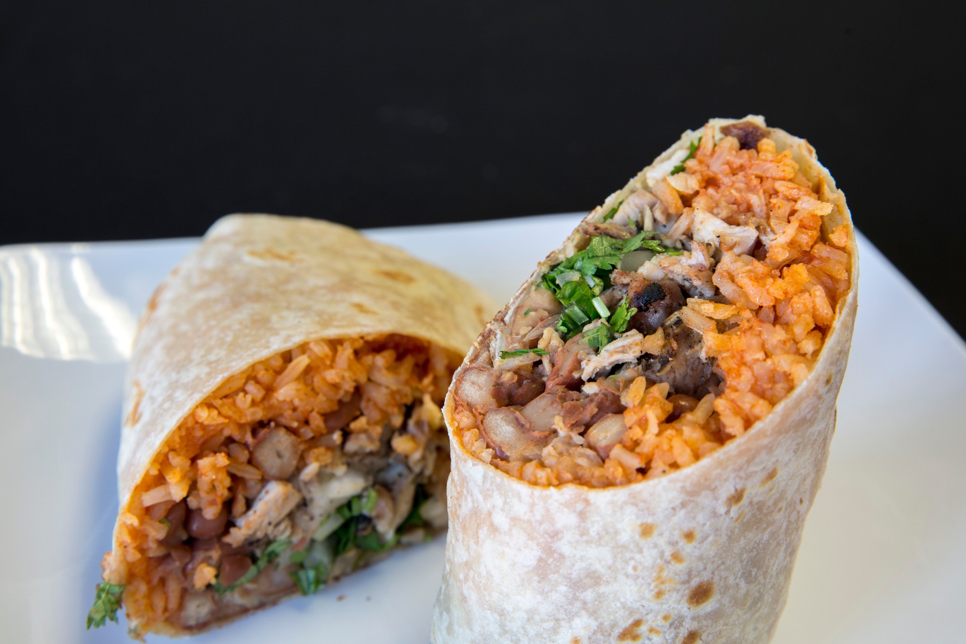 Two halves of a burrito